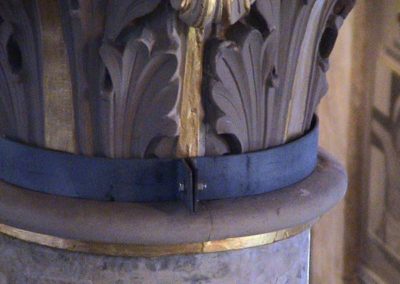 An existing fix to a damaged column before the restoration