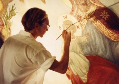 A CSS artisan conserving a mural